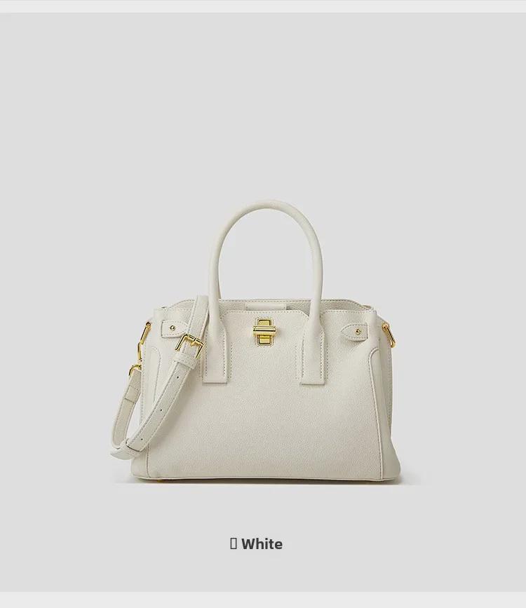 Chic Women's Tote Bag: Niche Design, Hand-Held Platinum, Large-Capacity, Fashionable Messenger Bag.