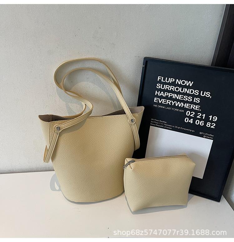 

Large-capacity fashionable portable bucket bag women s 2025 new simple temperament tote bun mother and child bag crossbody bag жовтий