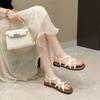 Koreansk version 2025 nya sommarsandaler med platt botten och snörning damskor fransk nisch retro remmar romerska skor