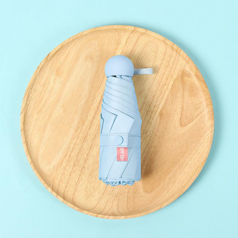 Parasol Capsule Sun Umbrella: 50% Off Mini UV Protection for Women, Dual-Purpose for Sun and Rain.