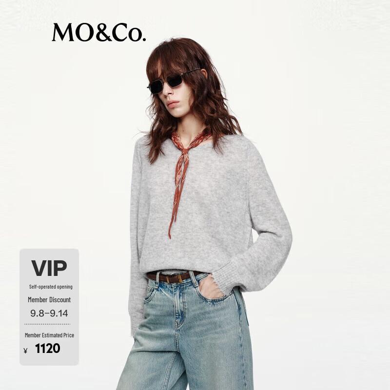 

MO&Co. Women s V-Neck Knit Sweater with Frayed Cuffs M