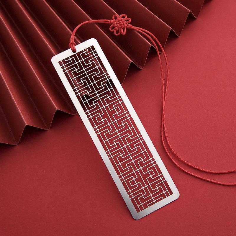 

Chinese Vintage Design Stainless Steel Hollow Bookmarks Metal Bookmarks Tasse with Red Knot Kids Students Gift School Supplies