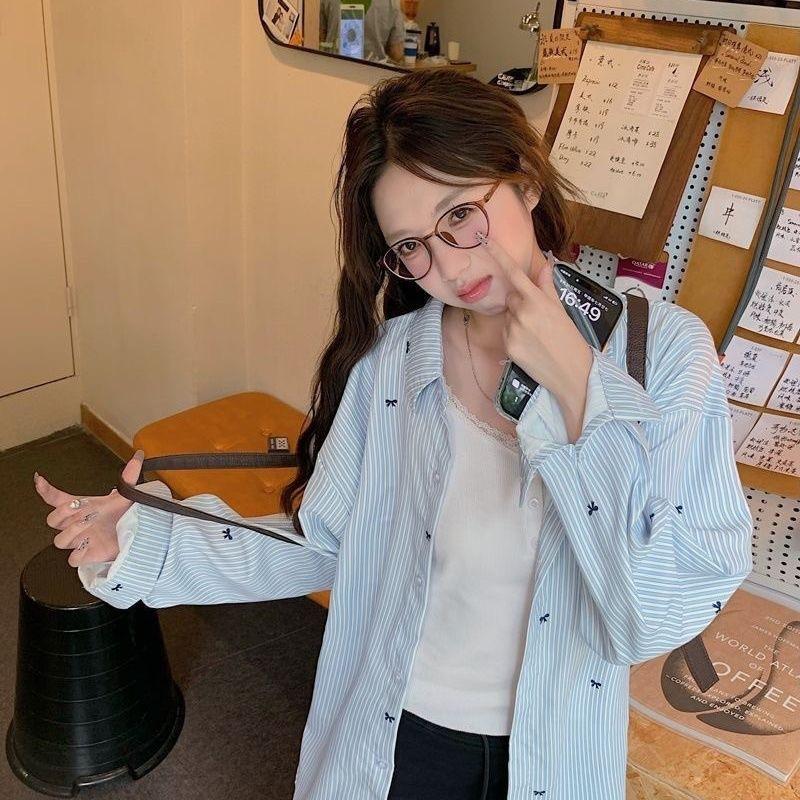 Modrá pruhovaná košile s potiskem mašle s dlouhým rukávem dámská designová nika volná košile všestranný top trendy