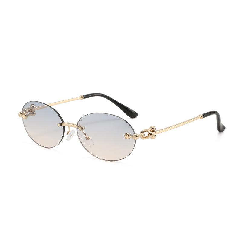Oval frameless metal sunglasses, new European and American glasses, retro sunglasses, trendy sunscreen sunglasses