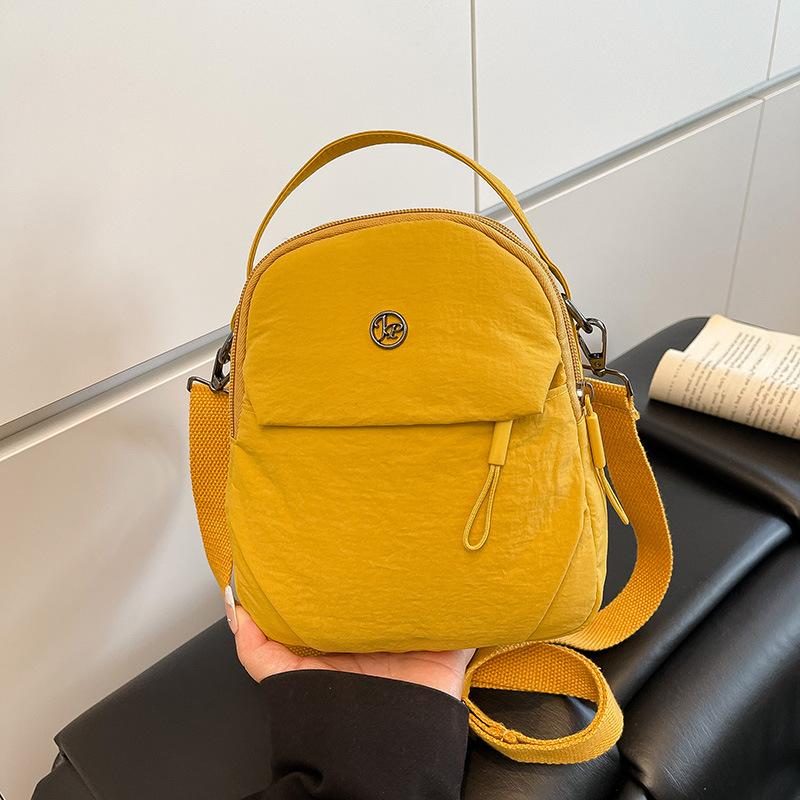 New nylon cloth mini mobile phone bag, female trendy small bag, light portable, simple and fashionable shoulder messenger bag.