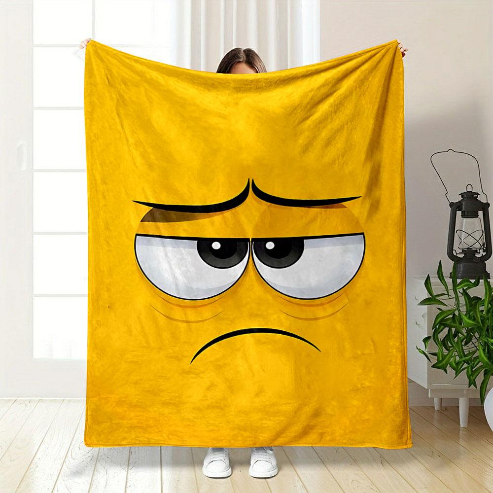Yellow background with a sad cartoon face featuring droopy eyes and frown. for all seasons blanket lunch break throw gift
