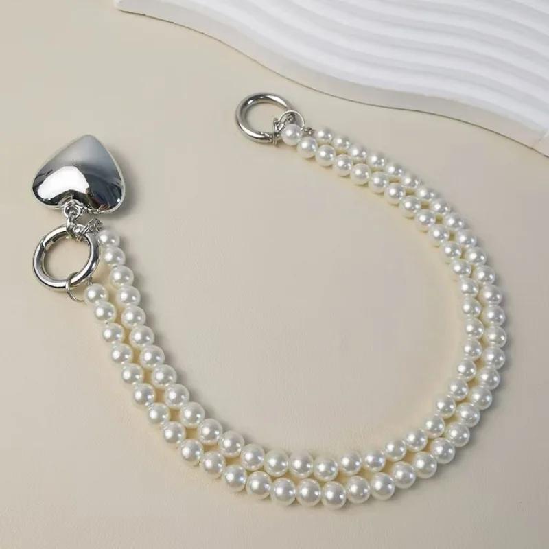 

Mobile phone lanyard short wrist strap fashionable high-end pearl handheld pendant love pendant shell universal clip type белый