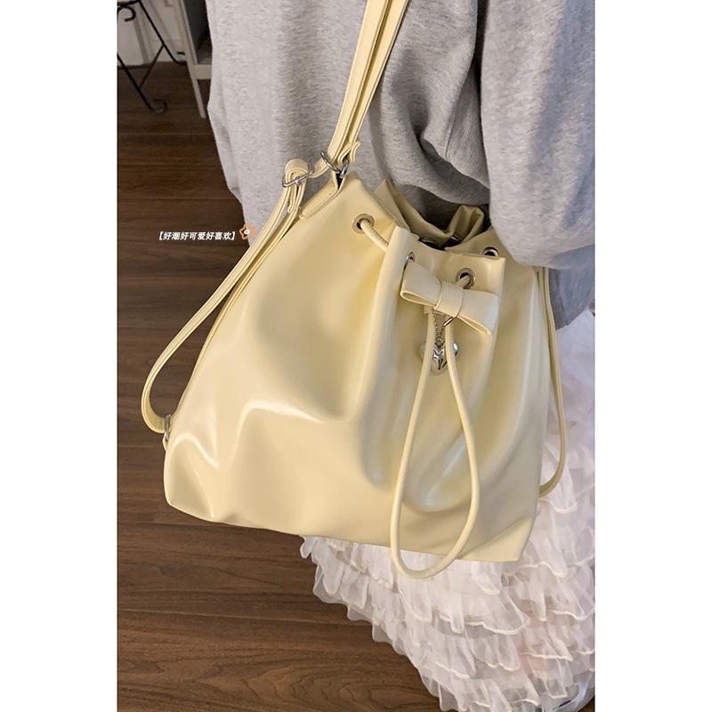 Korean version of large-capacity bucket bag 2025 new solid color niche simple casual shoulder bag multi-functional backpack