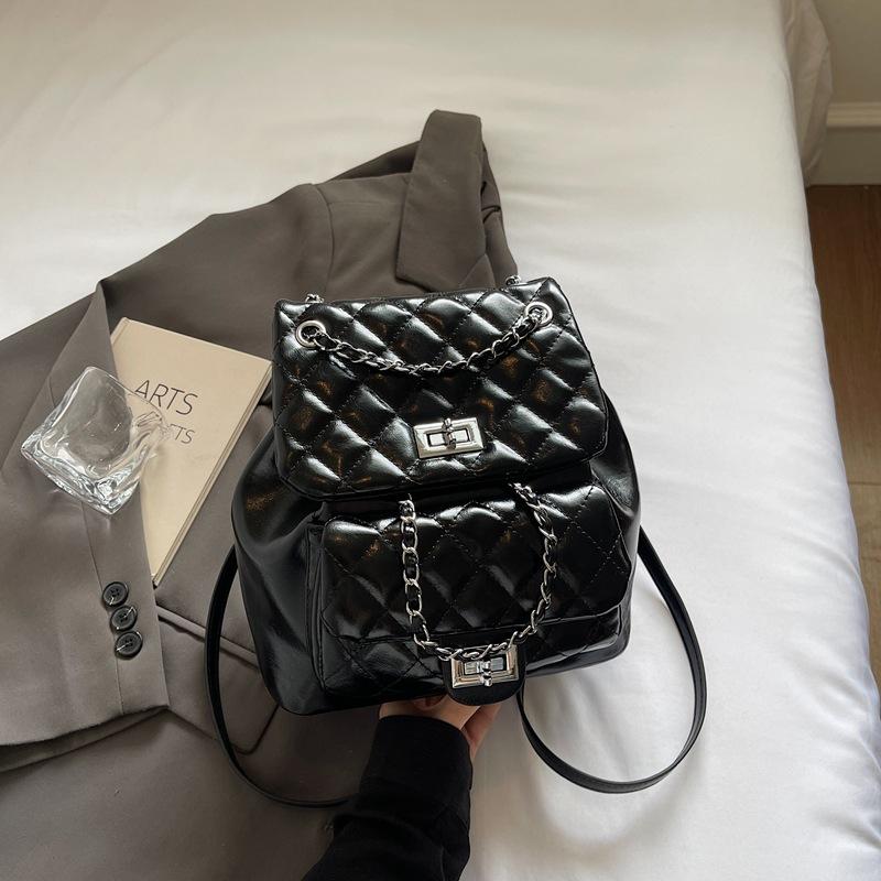 Korean niche chain lightweight small backpack women's 2025 summer new student commuting oblique span bag high value bag