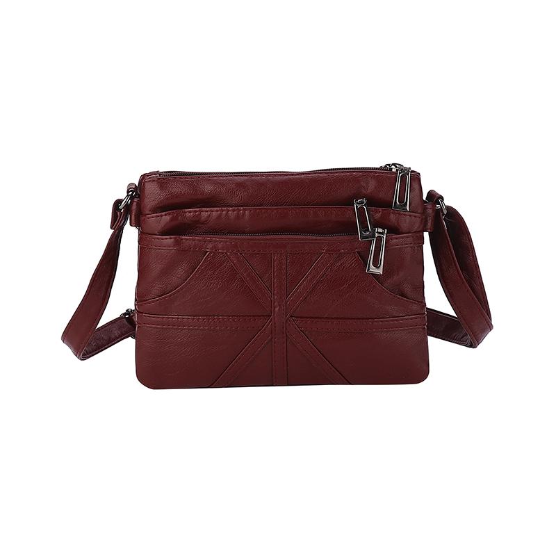 

Жіноча багатошарова сумка через плече. М яка шкіряна сумка через плече. Сумка для матері червоний