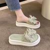 Bow Internet celebrity wearing versatile platform slippers 2025 new fairy style muffin non-slip beach sandals