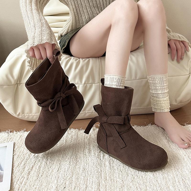 Fashion retro style bow short boots women's autumn and winter design sense lace-up single boots with skirt solid color Martin boots