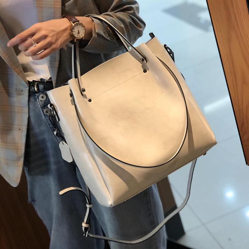 2025 Cowhide Women's Versatile Handbag, Genuine Leather Commuter Shoulder Bag - European/American Style, Large Capacity, High-End Feel