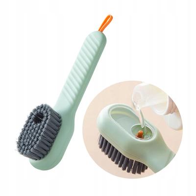 Brush For Cleaning Surfaces With A Dispenser For Shoe Scrubbing Liquid