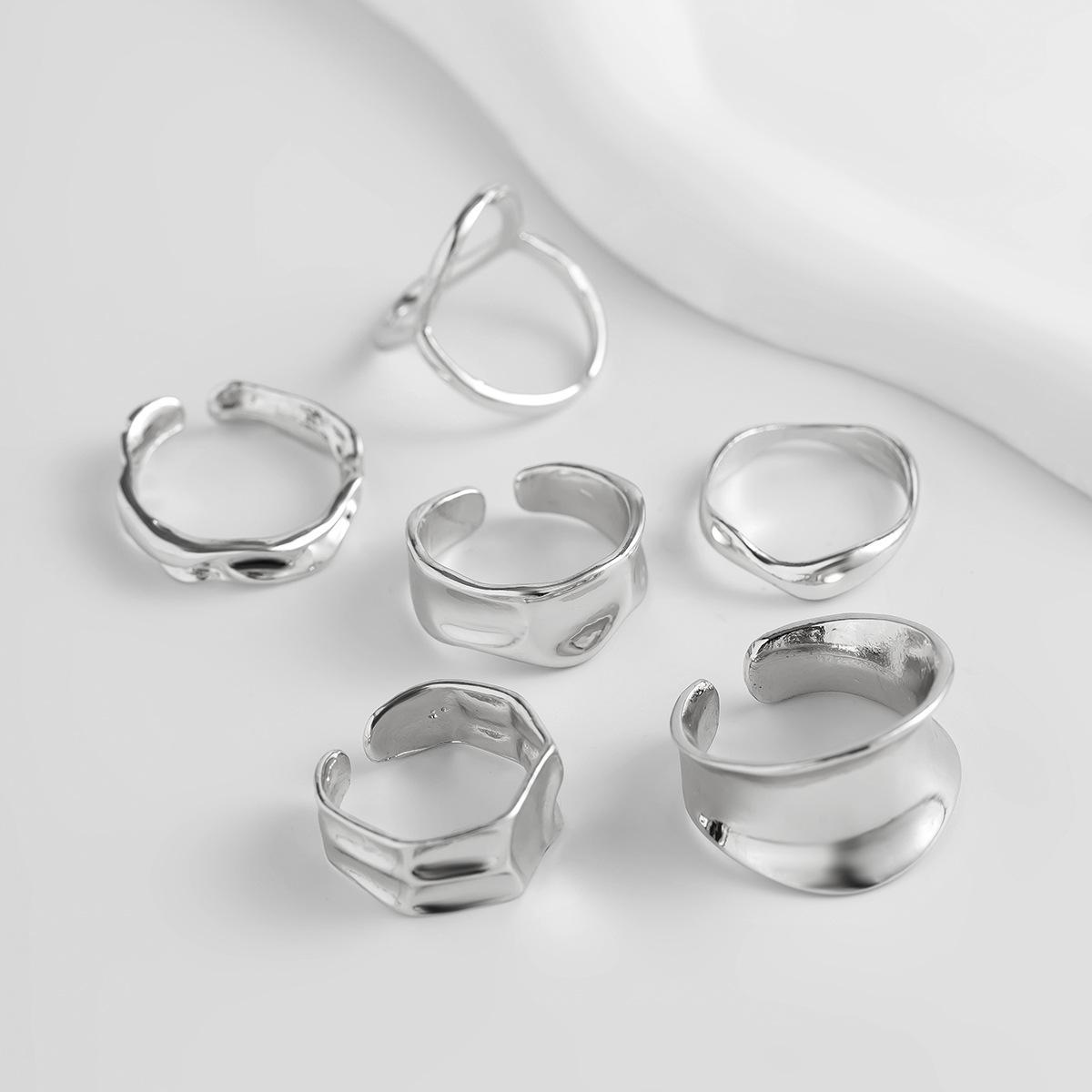 

Европейский и американский комплект ювелирных изделий из разных стран: Полые плиссированные кольца и браслеты из сплава неправильной формы, 6 шт.