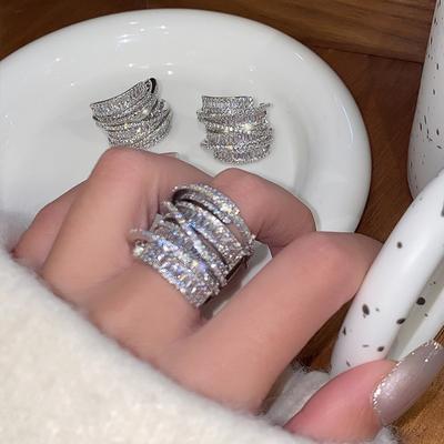 Bague enroulée en zircon avec chaîne, bague alimentaire créative exagérée, niche polyvalente pour femmes, bijoux à main haut de gamme