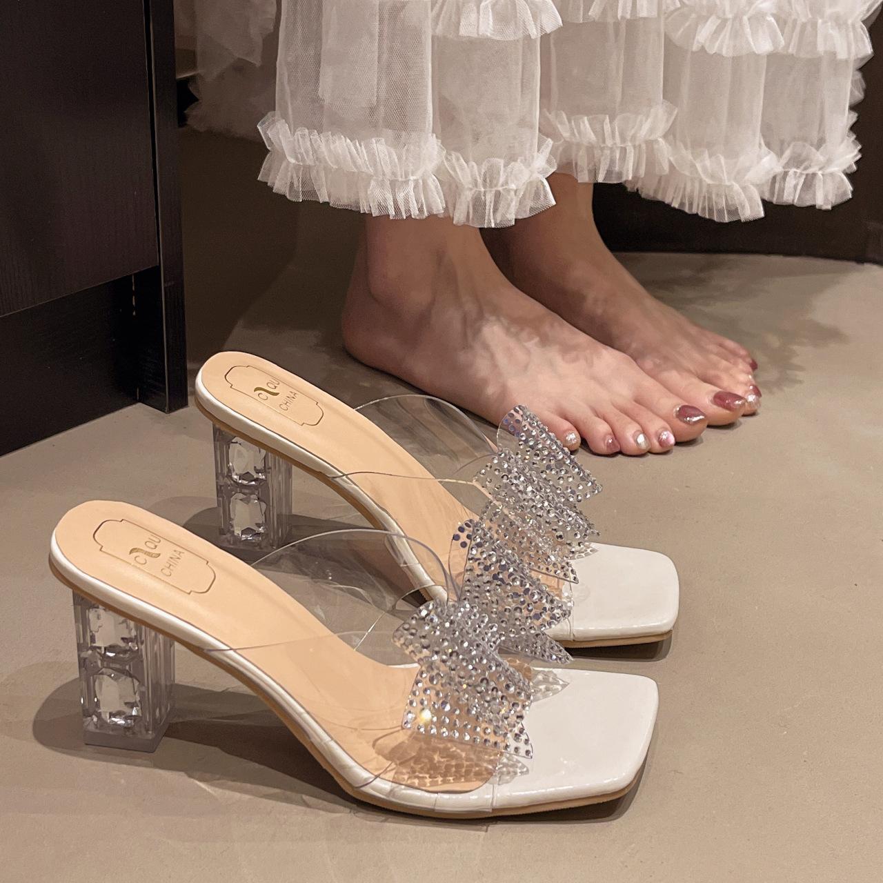 

Женские туфли на высоком каблуке 2025 лето новая верхняя одежда прозрачный хрустальный каблук сандалии женские толстый каблук стразы бант шлепанцы 35