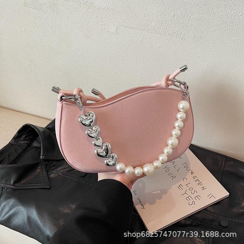 

High-end pearl chain small bag women s 2025 spring and summer new niche crossbody bag fashionable shoulder underarm bag розовый