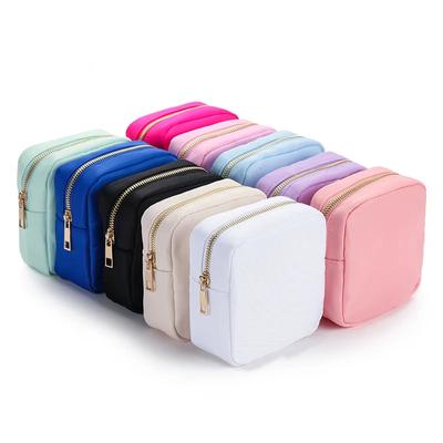 Mini borsa per il trucco in nylon, borsa per cosmetici, impermeabile, con cerniera, piccola borsa per monete, assorbente igienico, per donne e ragazze
