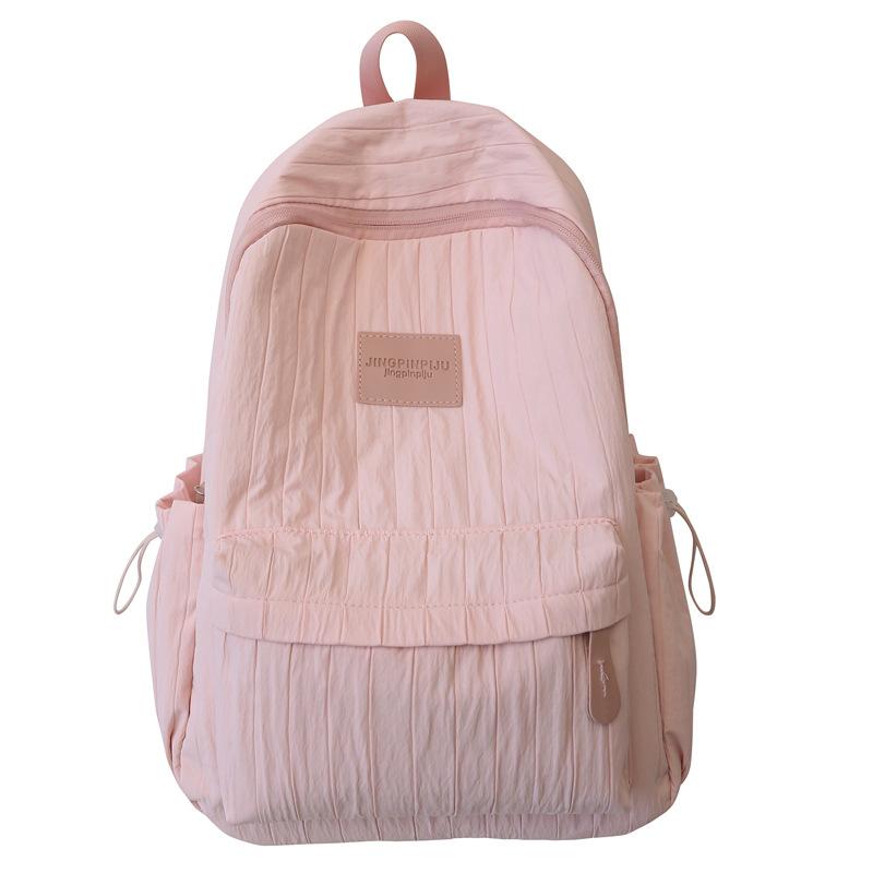 

Small fresh backpack solid color girl simple college schoolbag niche junior high school student travel backpack рожевий