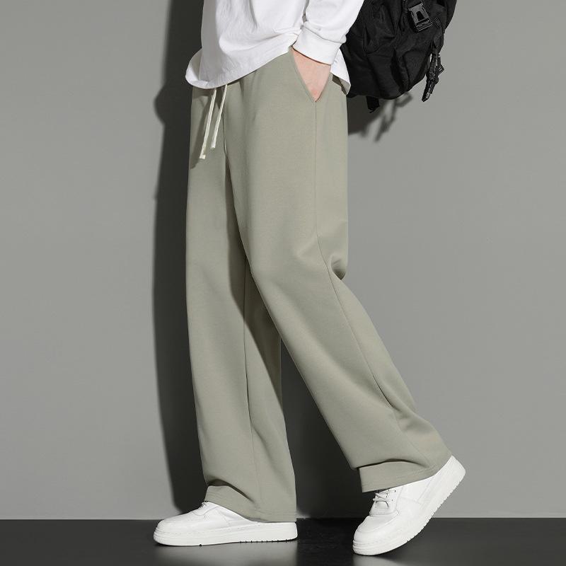 

Мужские широкие черные спортивные повседневные брюки - Коллекция Осень/Зима 2024 S зелёный/серый