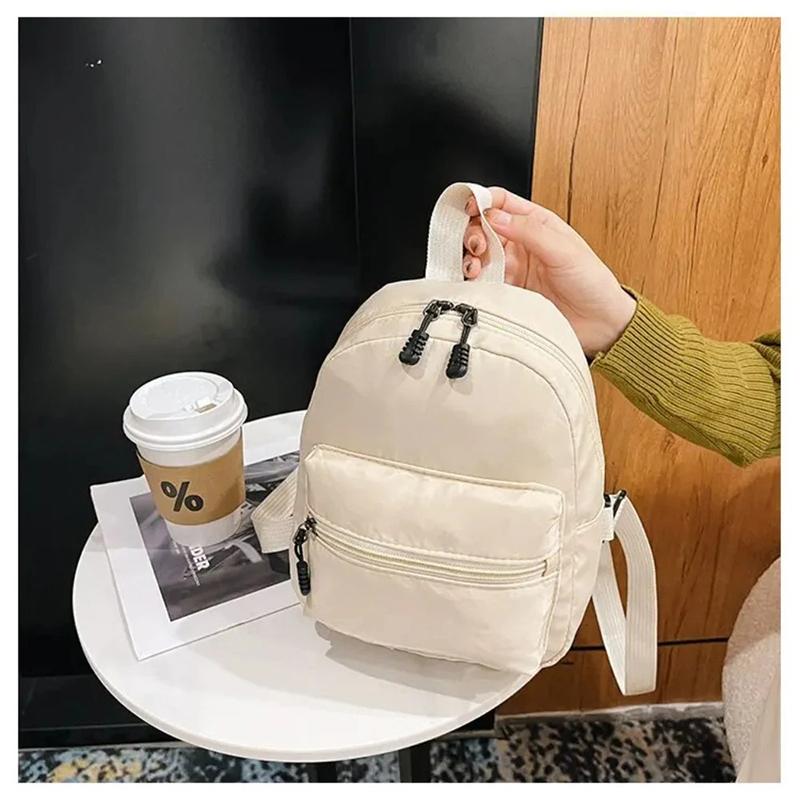 Mini Women's Backpack Trends: Nyl Women's Bags, Small Schoolbags, and White Canvas Backpacks Are Fashiable and Casual Pick