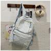 Striped backpack, large-capacity high school backpack, new lightweight schoolbag for junior high school students in the school season