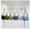 Unisex vodoodpudivá nylonová crossbody taška s více kapsami
