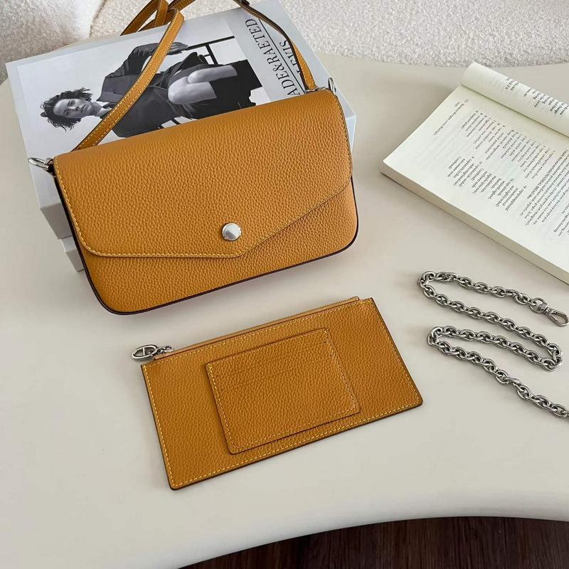 26 New leather women's bags, first layer cowhide lychee pattern envelope, mini small bag chain, single shoulder oblique span bag cross-border.