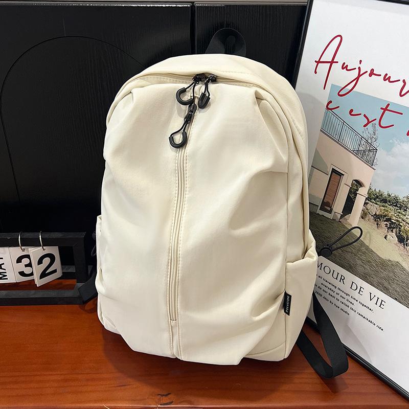 A Trendy and Lightweight Travel Backpack for Middle School Students In A Leisure Campus