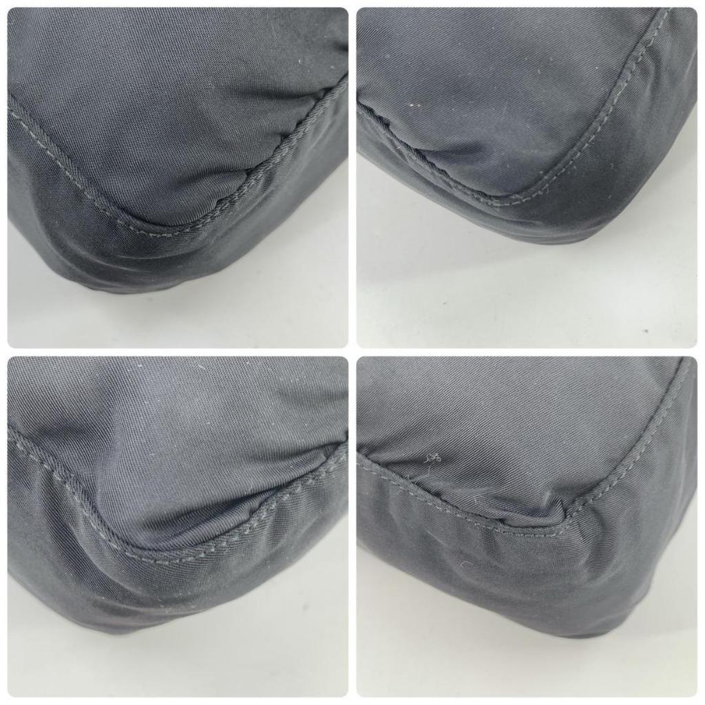 Prada Pocono Schultertasche Kameratasche Crossbody Tessuto Nylon Leder Schwarzer Schultergurt Crossbody Dreieckiges Logo-Schild Weißes Etikett