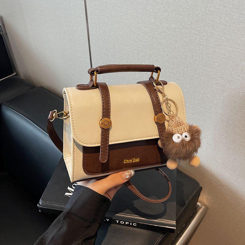 

High Sense Retro Small Bag Women 2025 New Early Spring Versatile Messenger Bag Fashion Super Popular Portable Square Sling Bag White Spell Brown [Collection Send Pendant]]