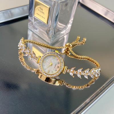 Hodinky mořská panna lehký luxusní módní diamantový náramek s volným nastavením křemíkové hodinky imitace perleti malé zlaté dámské hodinky