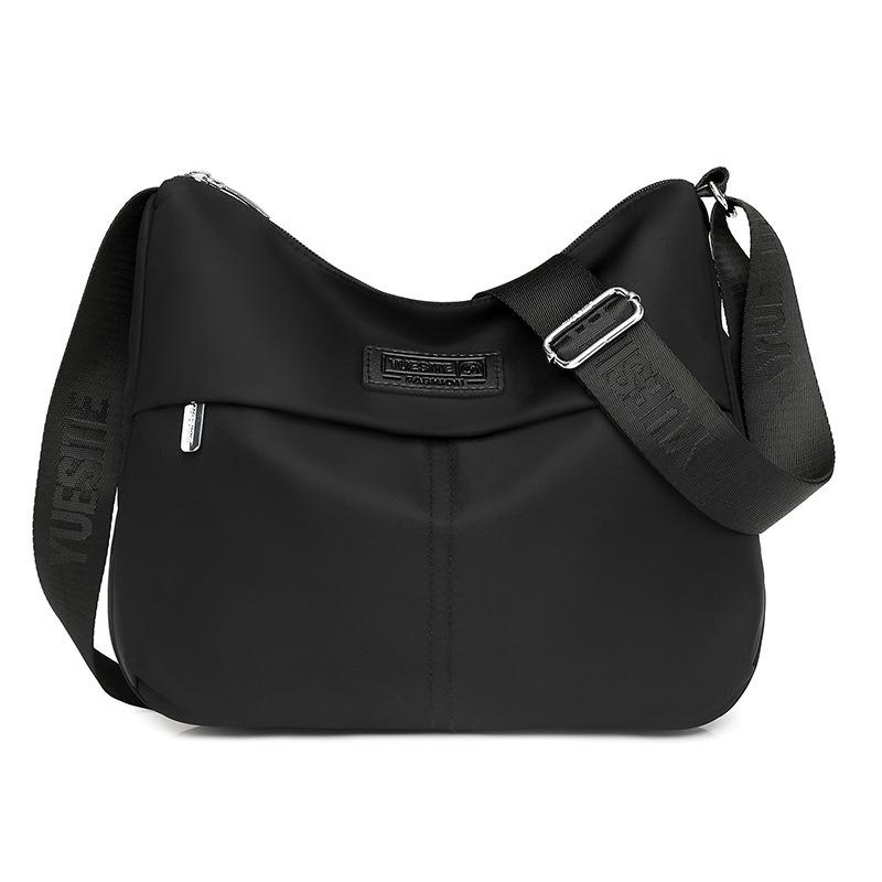 Einfacher und großzügiger Schulterrucksack Vielseitige, spritzwassergeschützte Nylontasche mit großem Fassungsvermögen Modetrend schräg getragener Damenrucksack