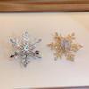 Elegant Rotating Snowflake Brooch: High-End Unisex Pin for Fashionable Sweater Decoration