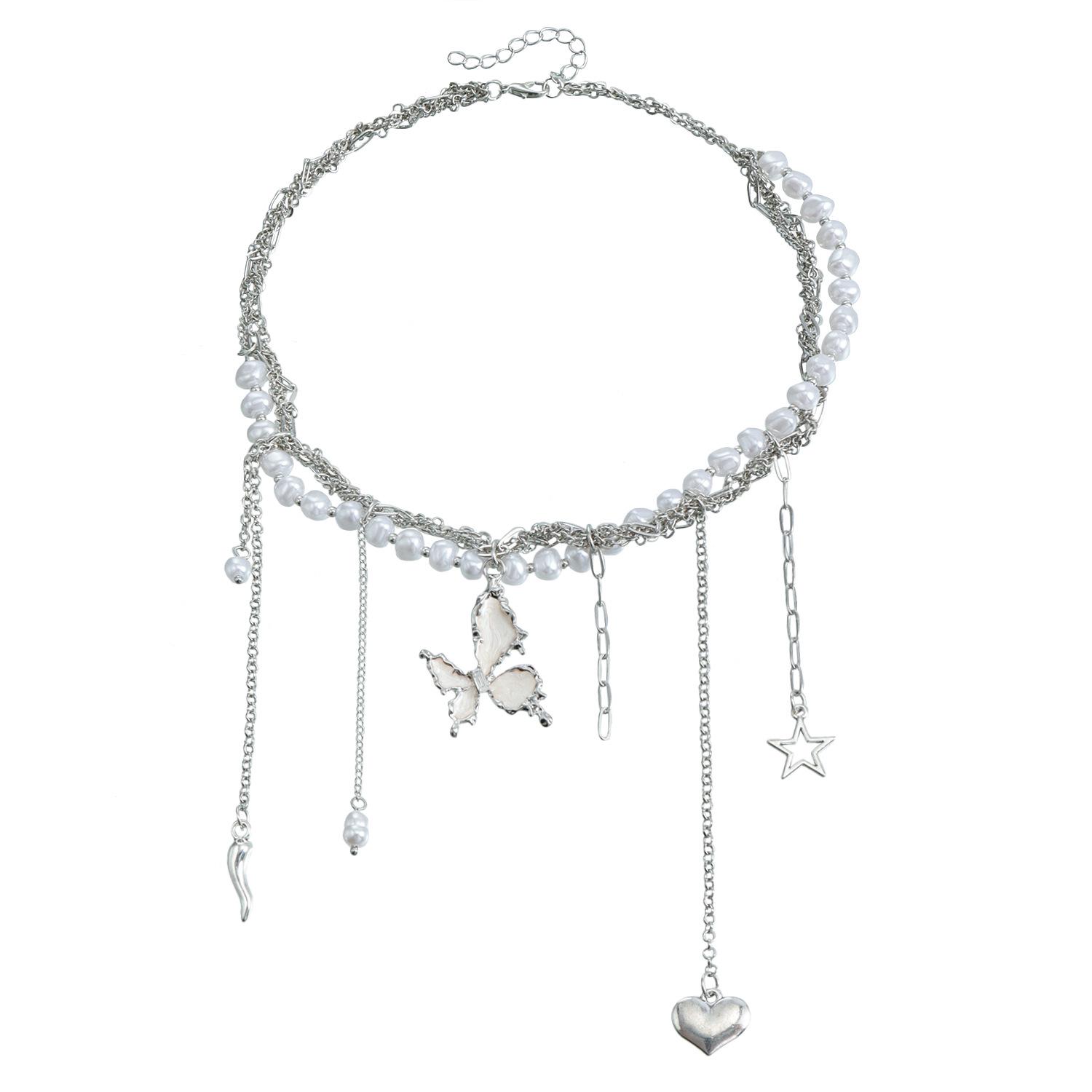 

Элегантное ожерелье с кисточкой из жемчуга и звезд: Роскошный дизайн класса люкс