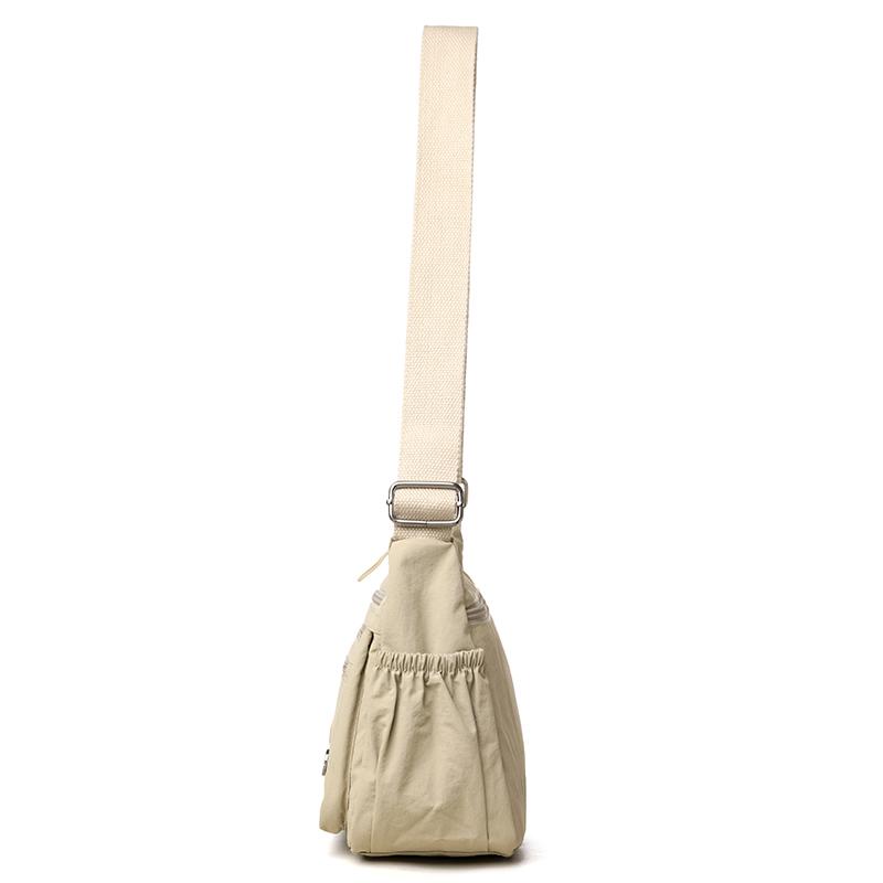 Dameskulderveske med stor kapasitet og lett vekt