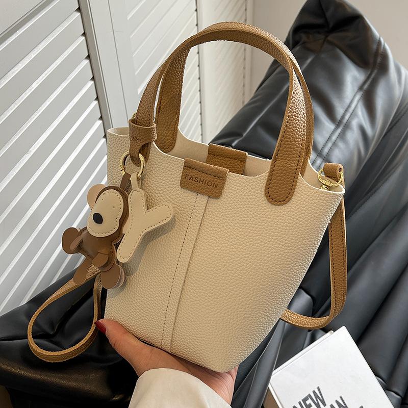 High-end Small Bag Women's New Fashion Versatile Vegetable Basket Portable Bucket Bag Textured Messenger Bag