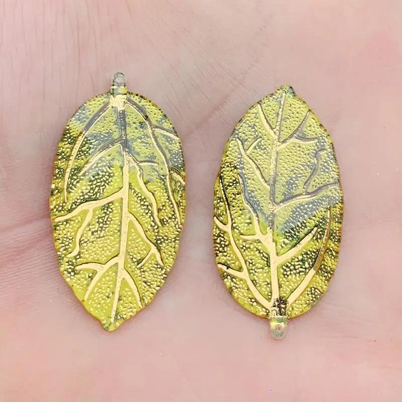 10 Stück 21*40mm Regenbogen Blätterförmige Harz Strass Applikation Kristalle Flatback Steine für Schmuck Handwerk Dekoration Anhänger