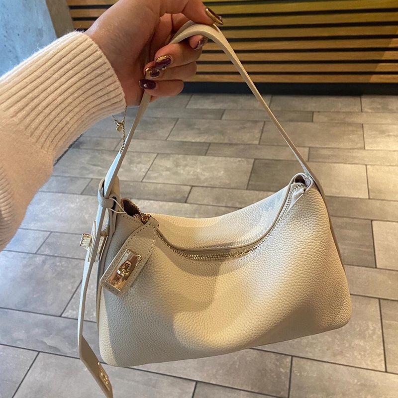 

White Genuine Leather Hobo Bag Women s 2025 New Light Luxury Niche Advanced Feeling Tong Qin Portable Shoulder Underarm Bag Beige White