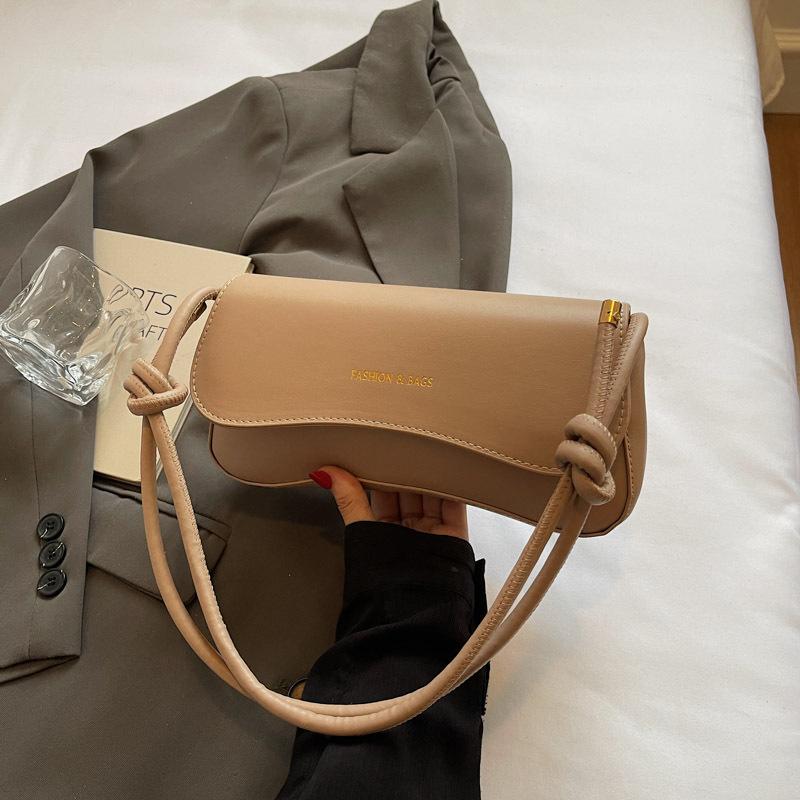 

Solid color bag women s new niche design trendy brand baguette bag retro shoulder underarm bag simple small square bag розовый