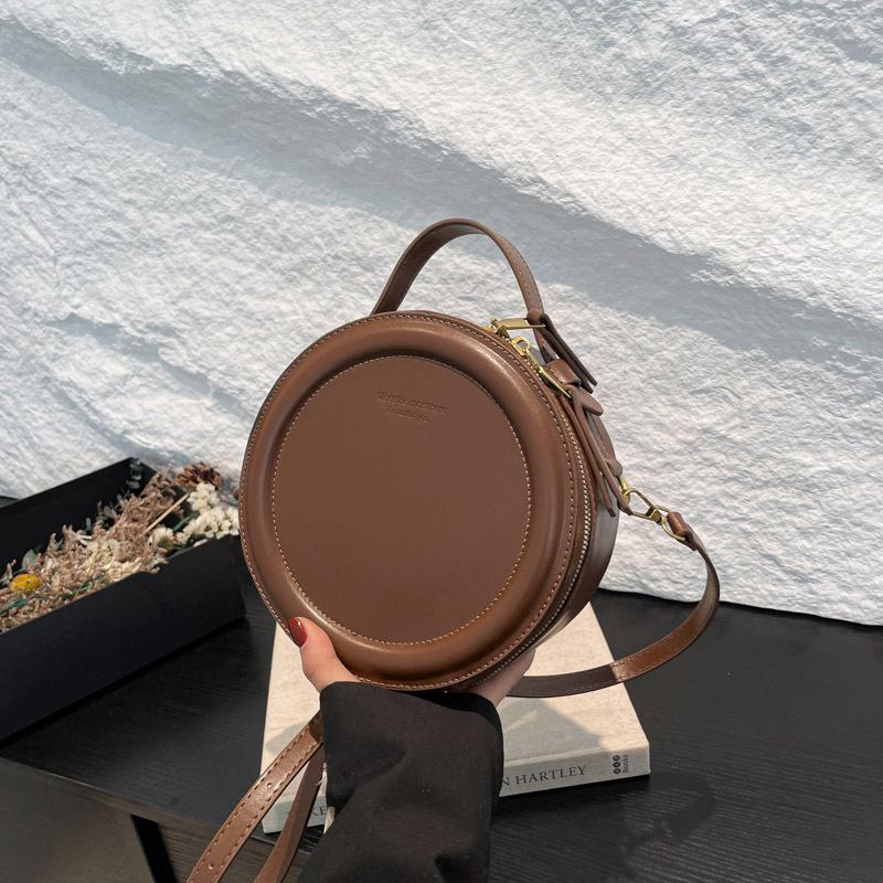 Niche Retro Hong Kong Style Women's Round Handbag - 2025 Early Spring Fashion, Versatile Single Shoulder Crossbody Bag