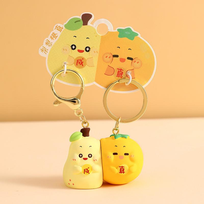 

Adorable Cartoon Couple Resin Keychain Perfect For Any Festive Occasion Pear Orange