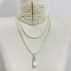 Elegant Multilayer Pearls Tassels Necklace Featuring Stylish Pearls and Gold Chain for Trendy Women Casual Wear