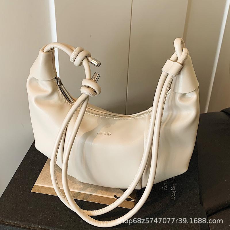 High-end dumpling bag women's 2025 summer new fashion pleated messenger bag Korean version niche single shoulder armpit bag