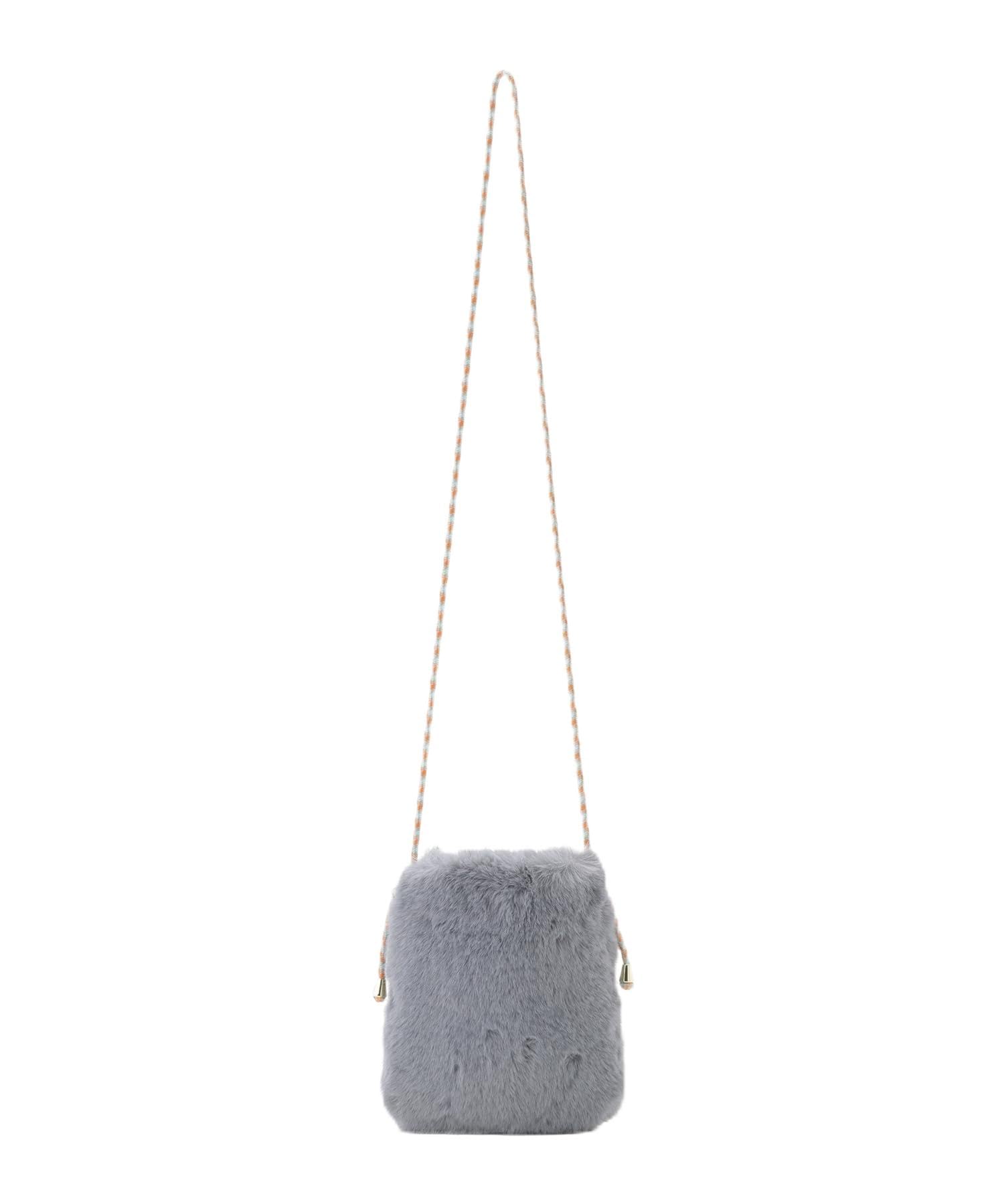 

Faviora faux fur bag by MOONBAT. This faux fur smartphone pouch and shoulder bag features a fluffy rex and lamb-like fur design, making it a perfect