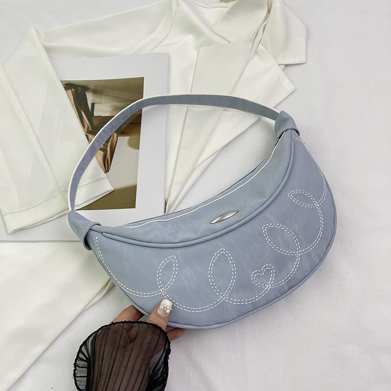 

Simple casual shoulder messenger bag women s simple fashion crescent bag 2024 summer new niche fashion armpit bag синій