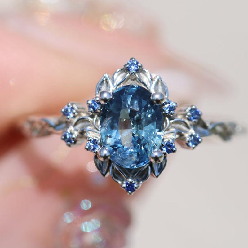 

European and American new fashionable red zircon inlaid light luxury personalized women s ring 10&Silver Plated