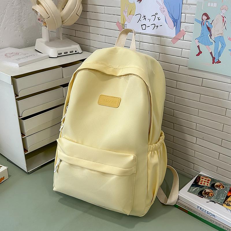 Schoolbag new female students junior high school students high school students large capacity college students backpack wind simple backpack computer