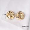Boucles d'oreilles puces en métal doré, style spirale, pour femme. Nouveauté bijoux en gros.